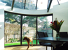 Curved glass house extension in Putney